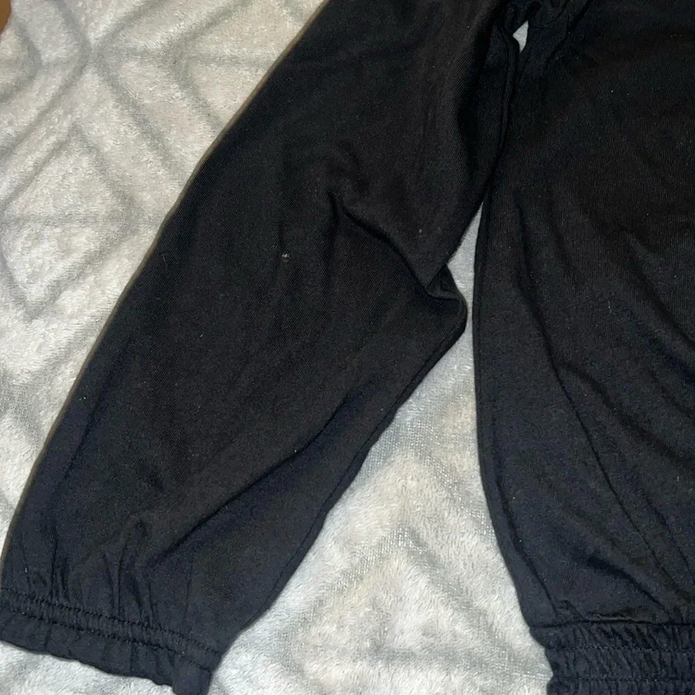 Carter’s Girl’s Black Long Sleeve With a Heart Detail.